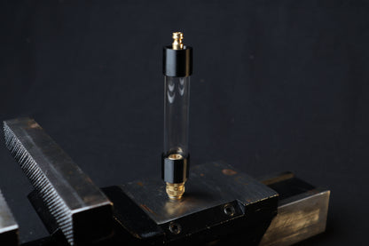 Vacuum bleed mini tank